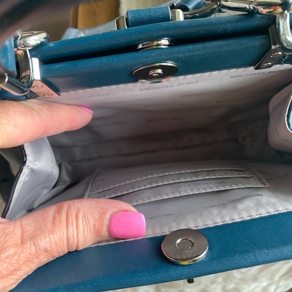 Handbags - Michael Kors mini bag.